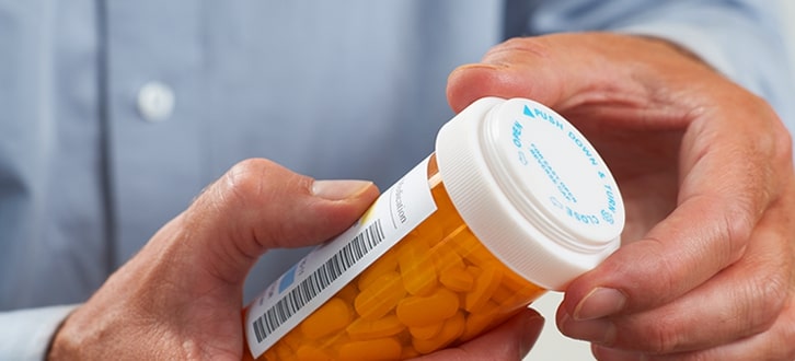 Reviewing prescription bottle