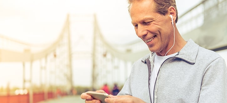 a man outside on his cell phone 