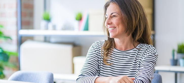 A woman smiling 