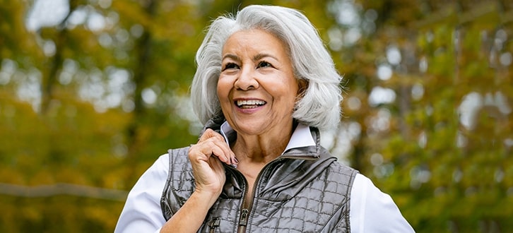 A woman outside talking a walk