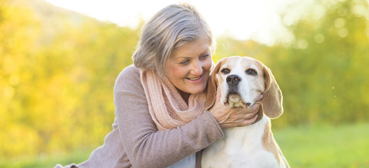 Woman petting dog